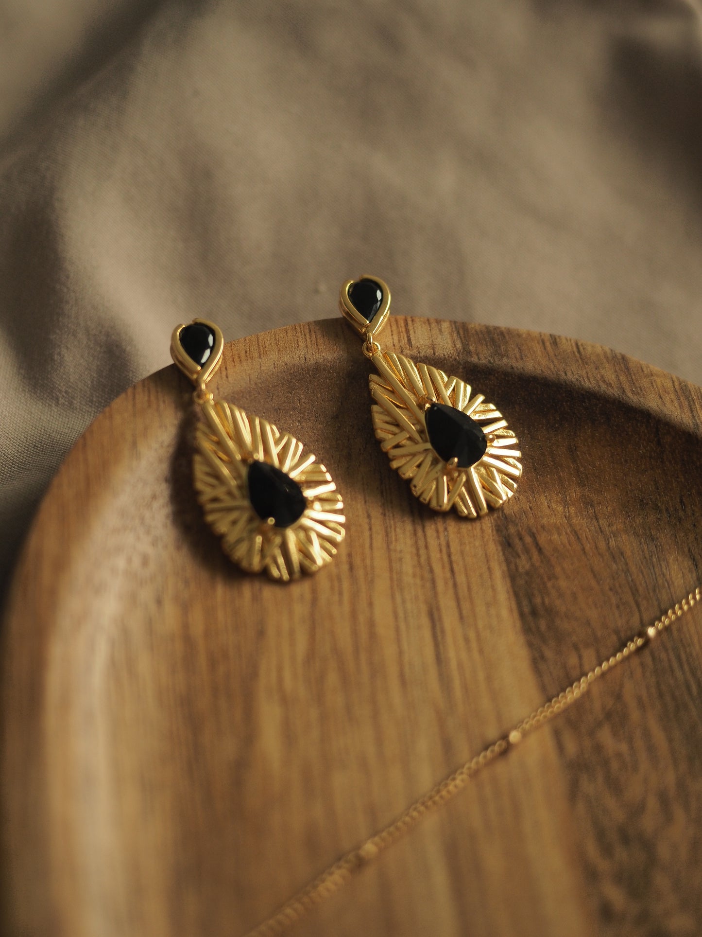 THE SECRET POWER EARRINGS