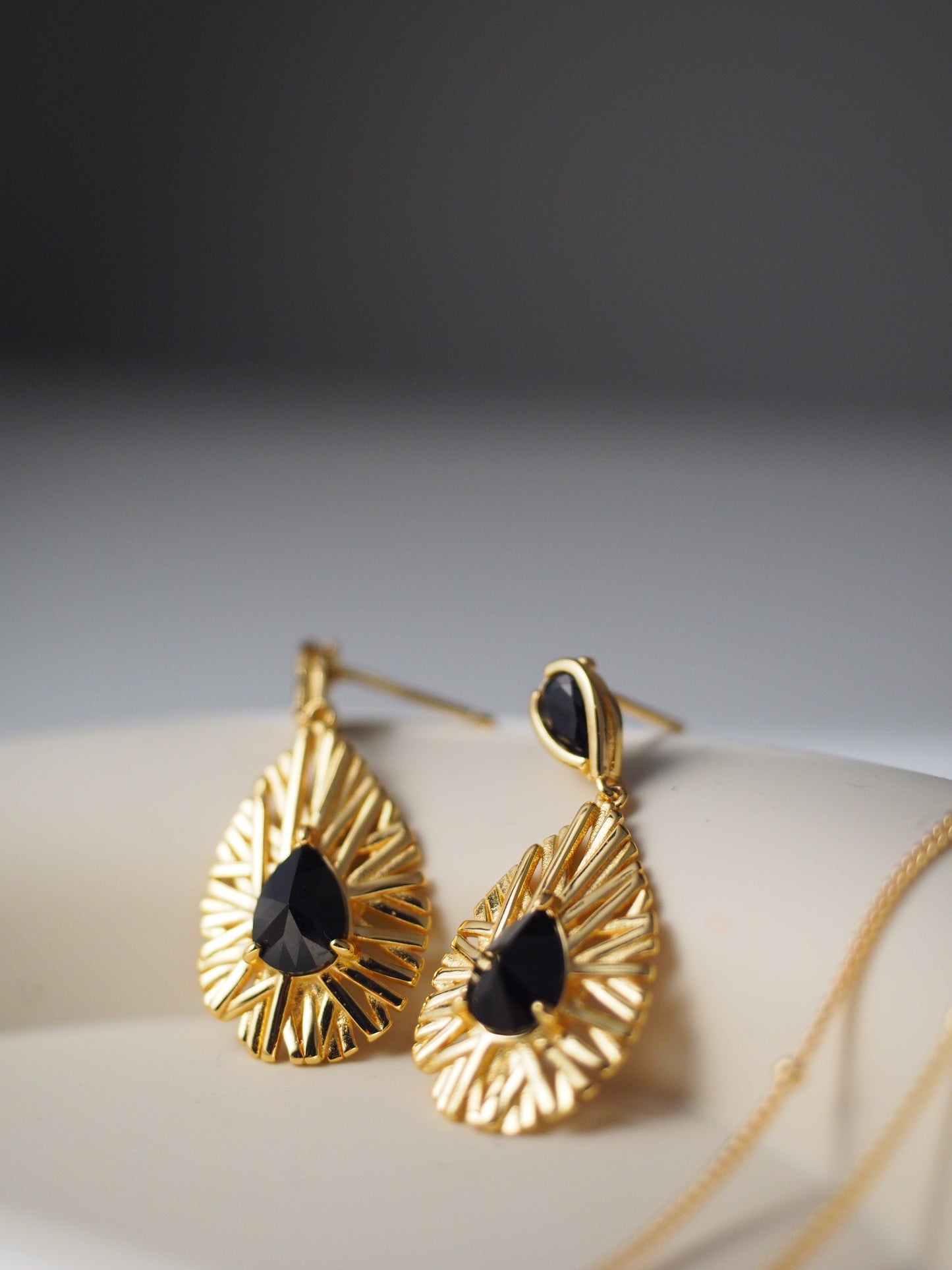 THE SECRET POWER EARRINGS